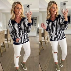 Striped hooded kangaroo pocket pull over.